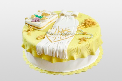 Żółto-biały tort na komunię