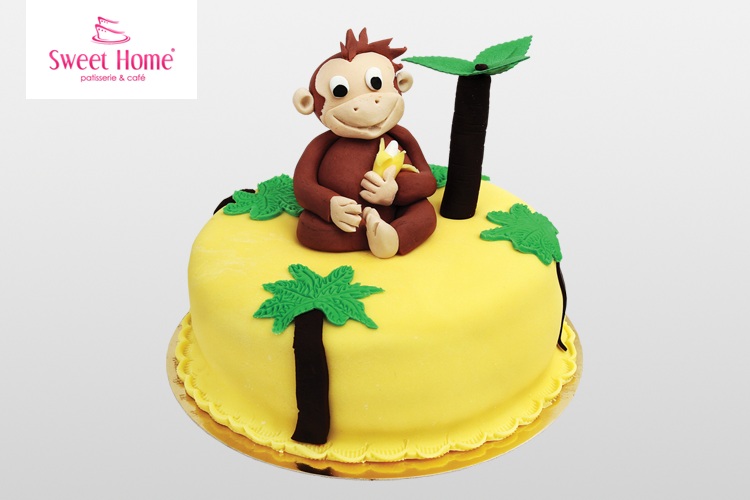 Tort z małpką, bananem i palmami